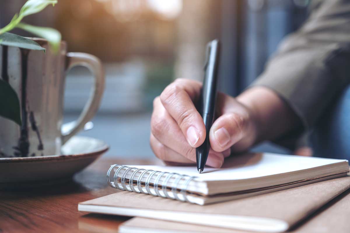 Hand writing on a notebook